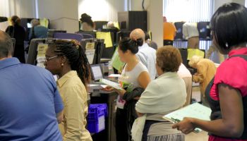 People waiting to use the voting machines in City Hall at Miami Beach.