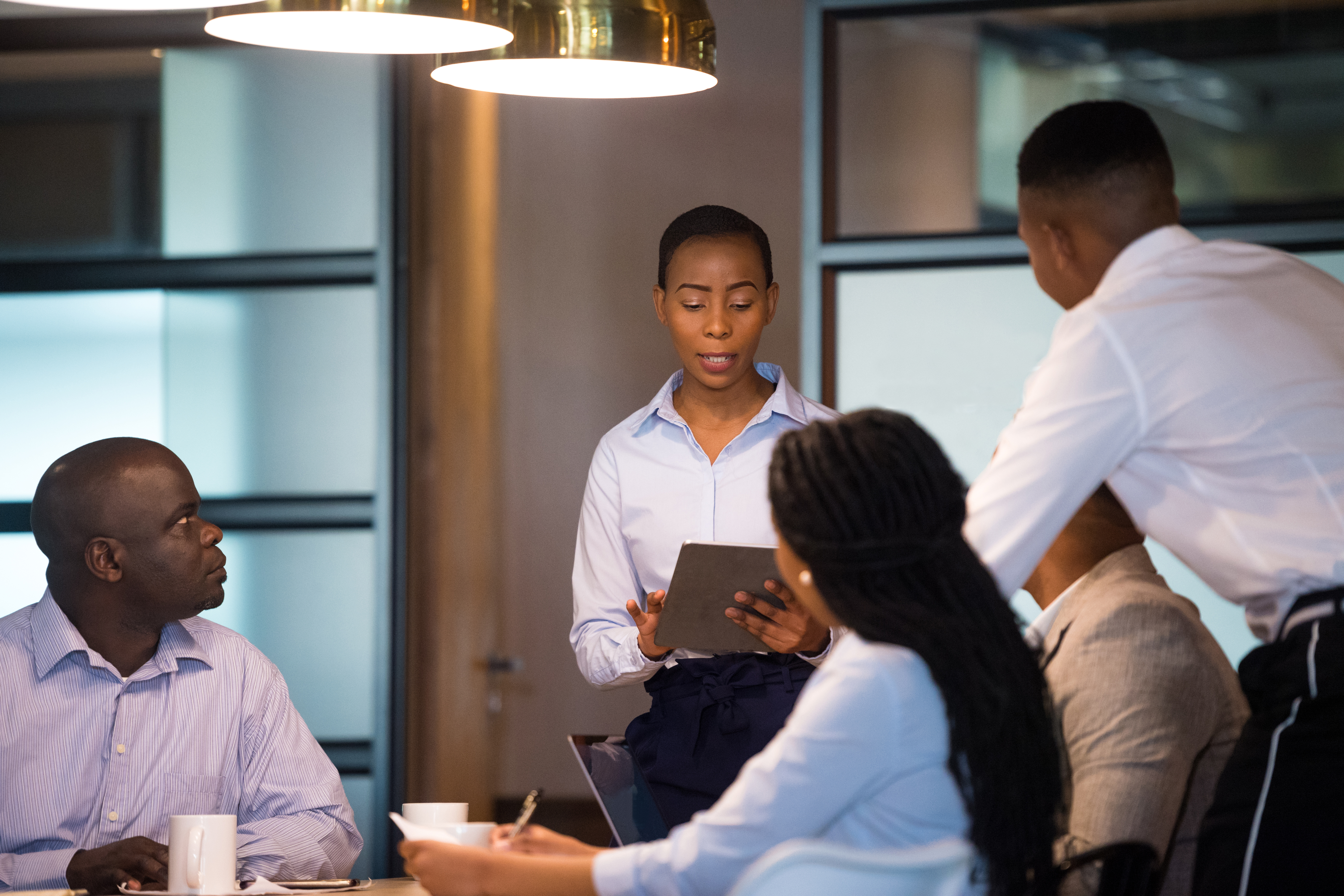 Confident businesswoman leading a board meeting