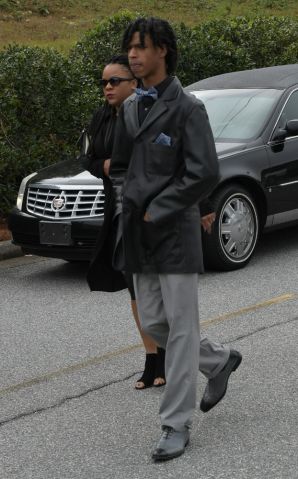 Mourners including Tichina Arnold arrive at the funeral service for Kim Porter at the Cascade Hills Church in Columbus, Georgia