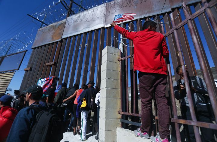 Immigrant Caravan Members Gather At U.S.-Mexico Border