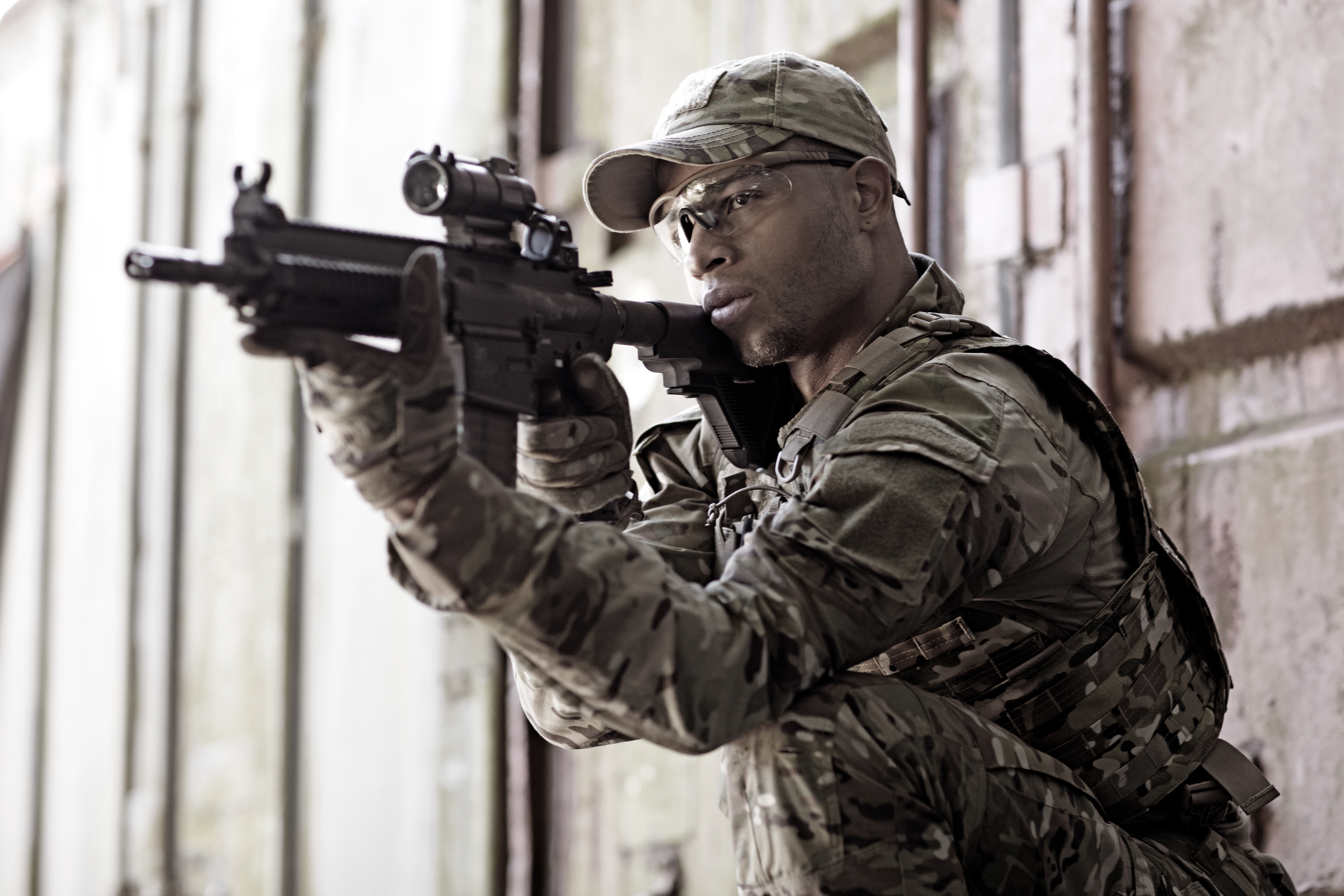 Lone African American Male soldier in outdoor setting