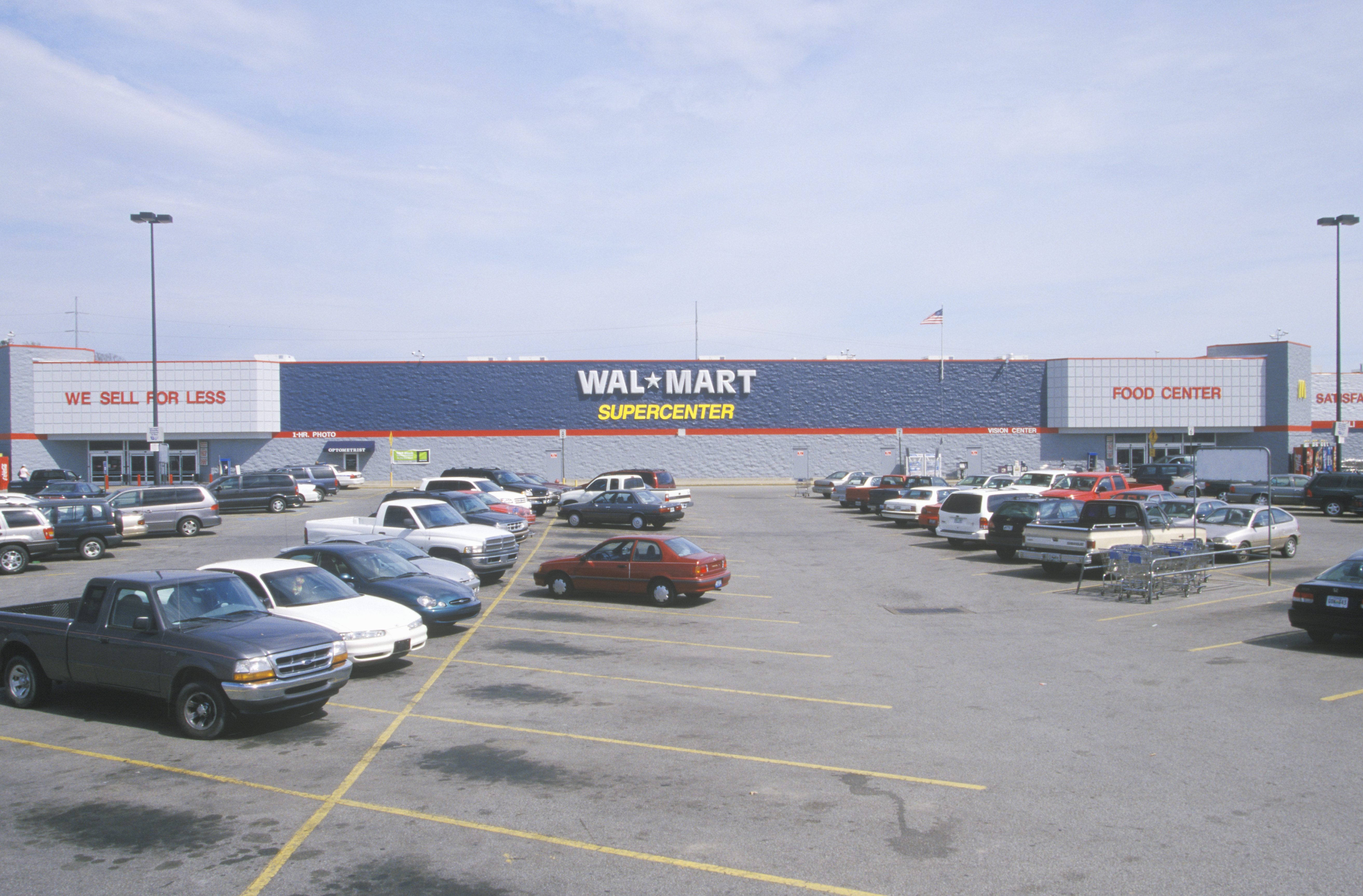 Parking lot and Wall Mart Supercenter in AR where prices are cheap