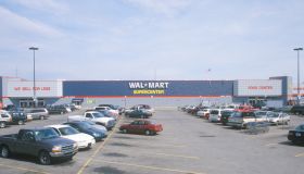 Parking lot and Wall Mart Supercenter in AR where prices are cheap