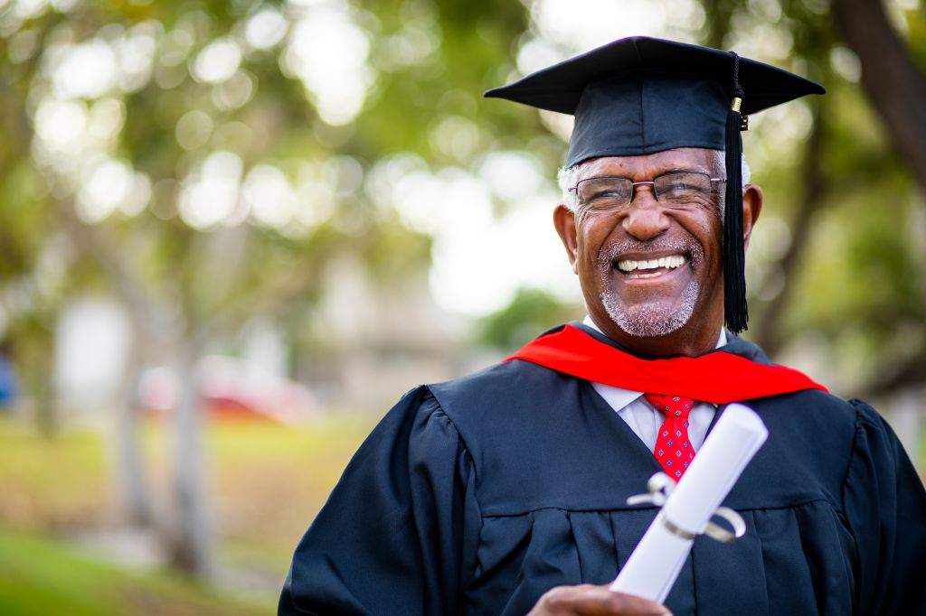 Portriat of a senior black graduate