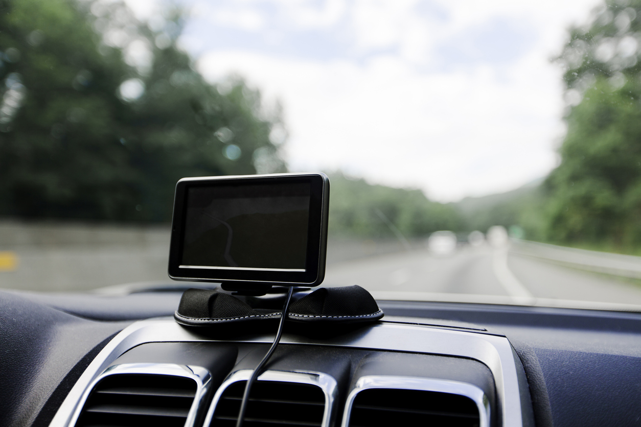 Global Positioning System on dashboard of car