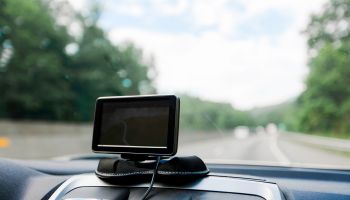 Global Positioning System on dashboard of car