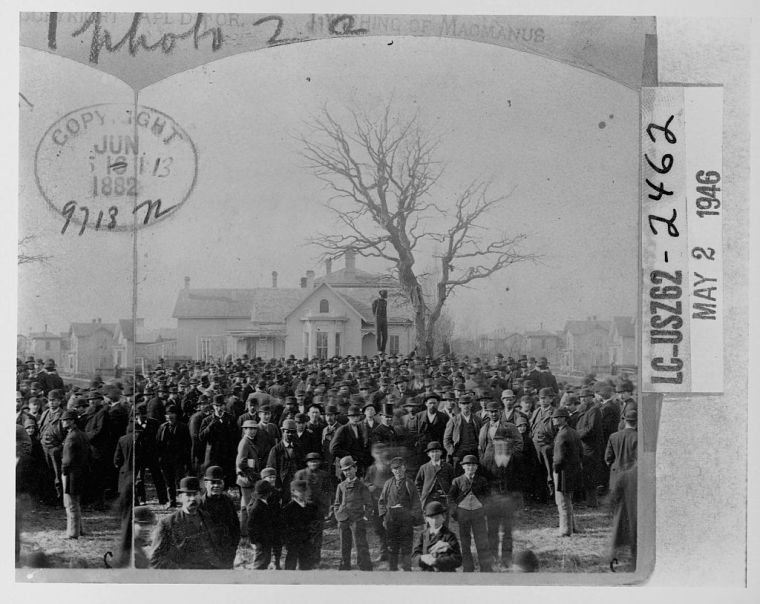 Lynching Victim Hanging Above Crowd