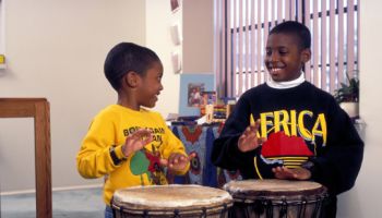 African American brothers playing drums