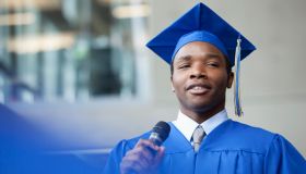 male valedictorian speaking at graduation