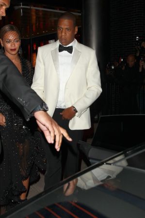 Solange walks in front of sister Beyonce and Jay-Z after having a fight with Jay-Z inside of the elevator. After attending a MET Costume Gala.