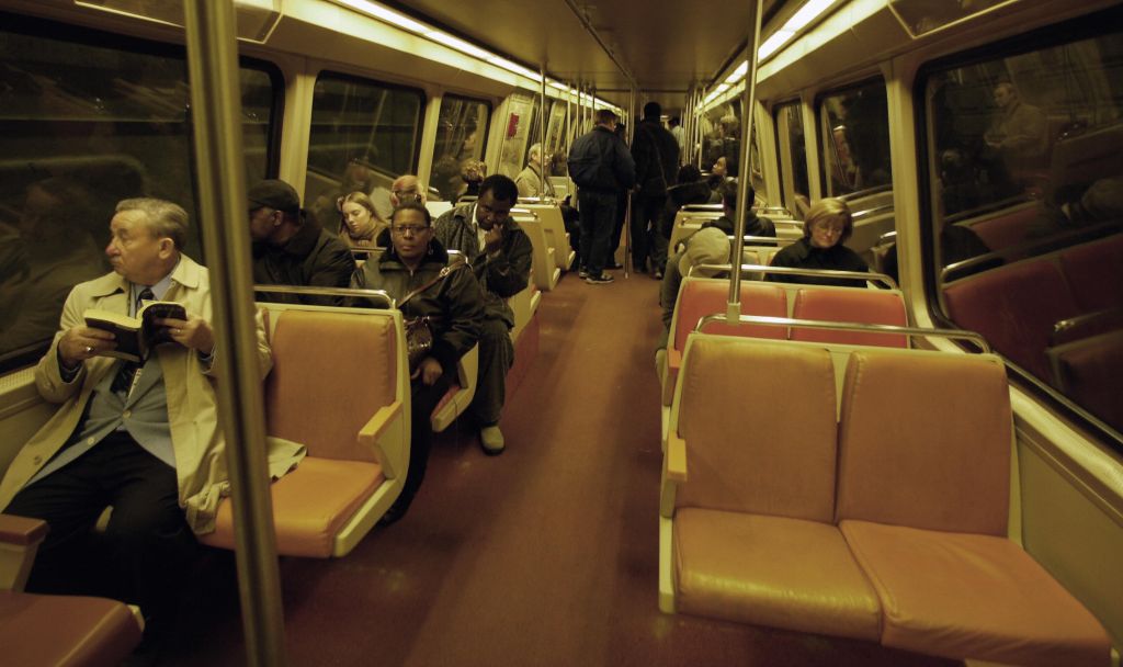 Travelers going by Washington DC's Metro