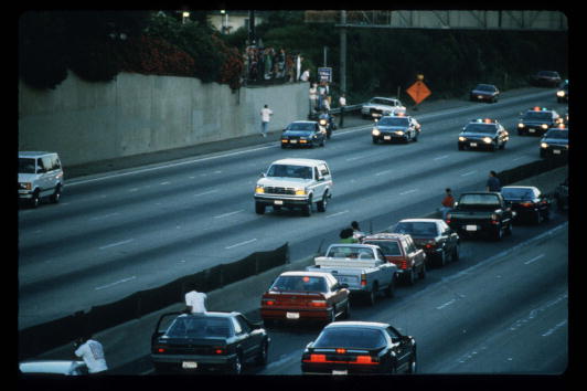 Motorists Wave At O.J. Simpson During Police Freeway Pursuit