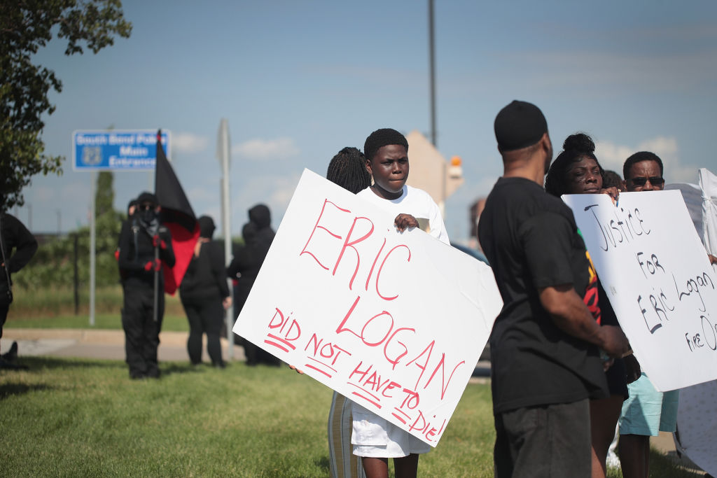 Demonstrators Hold A Protest Outside South Bend Police Station After Funeral For Eric Logan