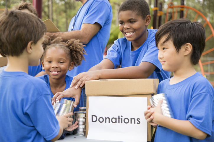 Children's sports team charity drive for donations, local disaster relief.