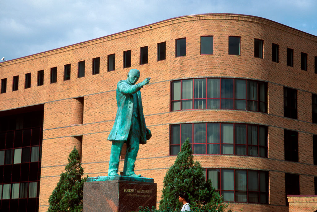 Booker T. Washington Monument with William & Norma Harvey Library beyond, Hampton University, Virginia.