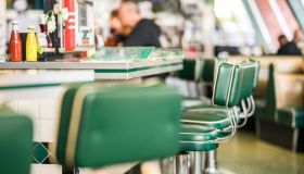 Vintage padded bar stools in an American diner restaurant.