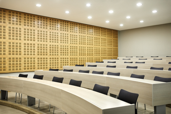 Interior of empty illuminated lecture hall