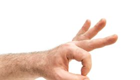 Cropped Hand Of Man Gesturing Against White Background
