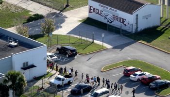Fired Parkland Cop Who Hid Behind Car During School Shooting Gets Job Back