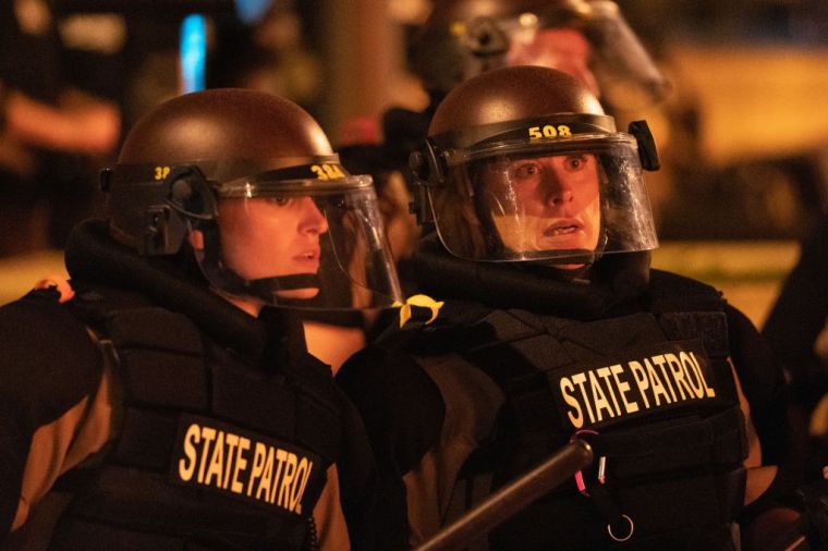 Minnesota community members mourned, protested and looted in reaction to George Floyd dying in police custody