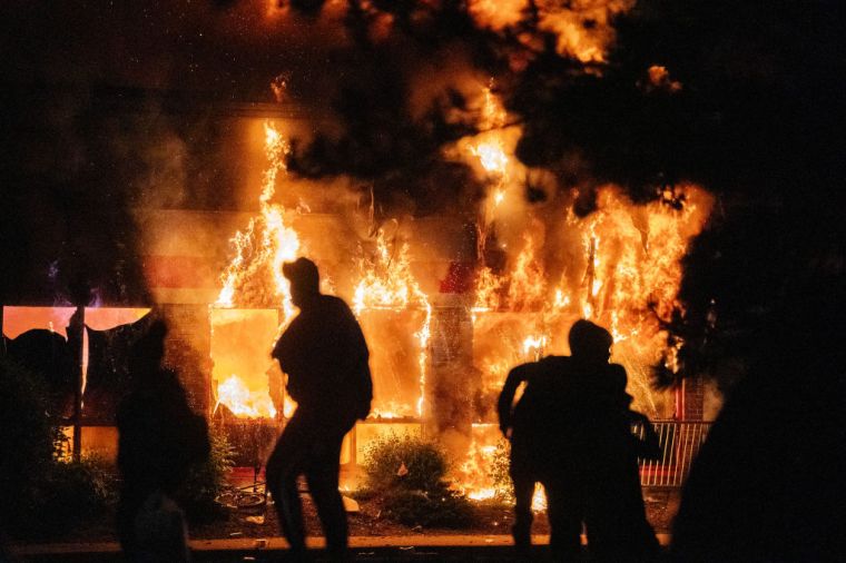 Minnesota community members mourned, protested and looted in reaction to George Floyd dying in police custody