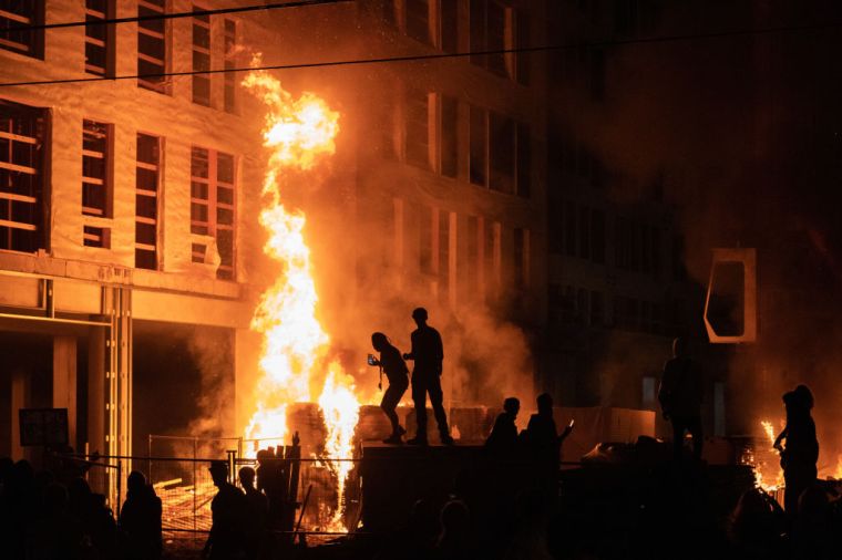Minnesota community members mourned, protested and looted in reaction to George Floyd dying in police custody