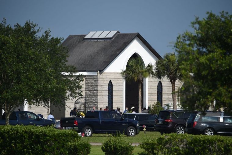 Mourners attend the funeral of George Floyd at the Houston Memorial Gardens cemetery in Pearland, Texas