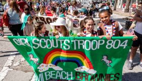 Miami Beach, Veterans Day Parade, Brownies Girl Scouts troop marching with banner