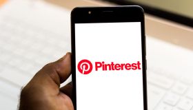 In this photo illustration the Pinterest logo is seen...