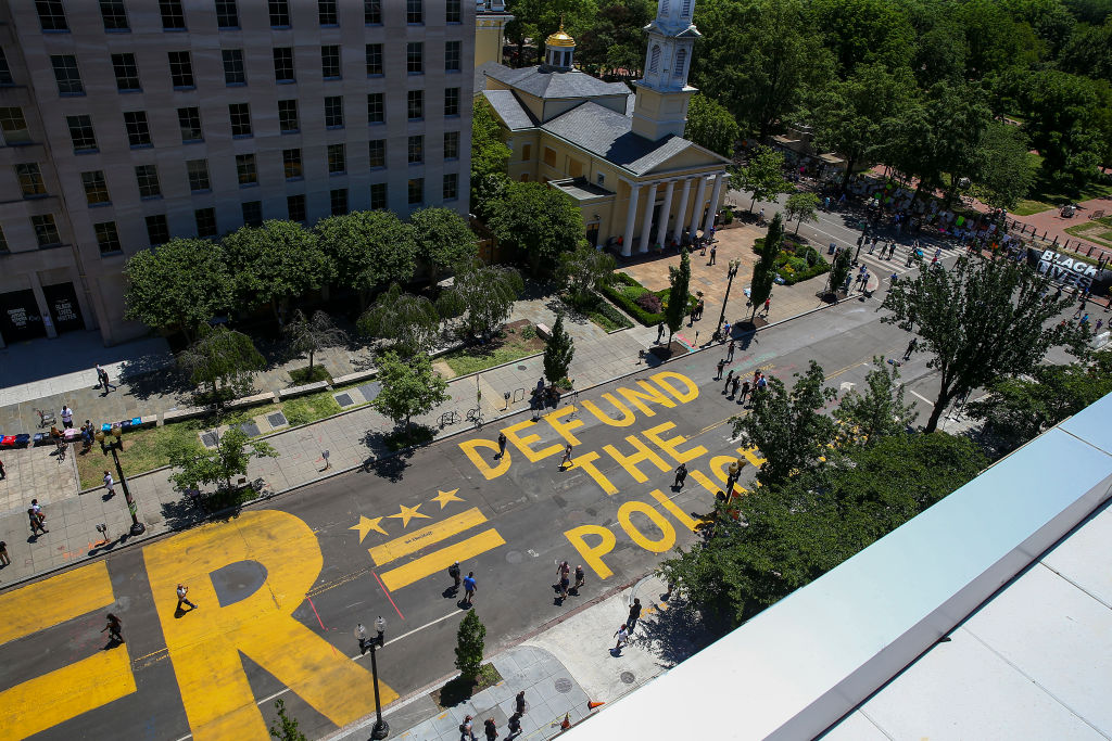 Protestors Add "Defund The Police" Messaging To Washington DC Street