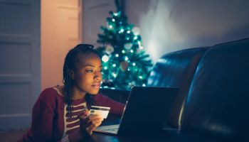 Woman online buying Christmas gifts