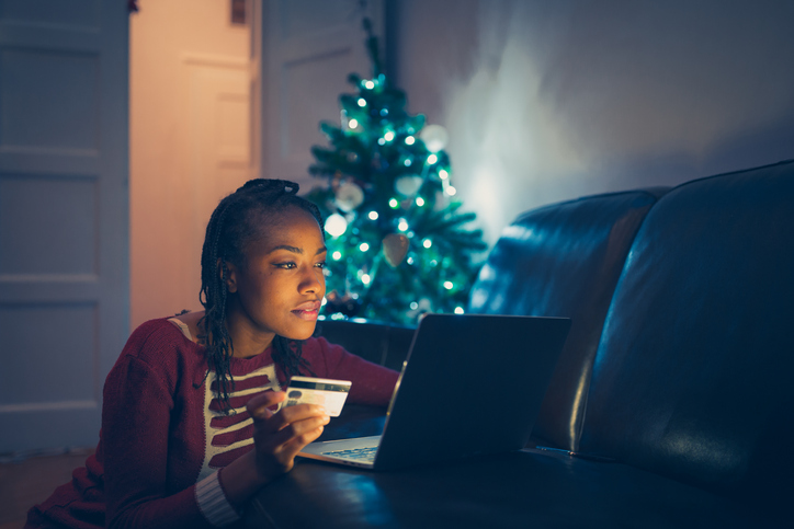 Woman online buying Christmas gifts