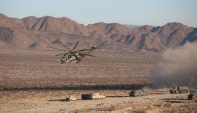 A CH-53E Sea Stallion Helicopter flies in for a simulated medical evacuation during the Tank Mechanized Assault Course aboard Marine Corps Air Ground Combat Center Twenty-nine Palms, California. Dated 2014.