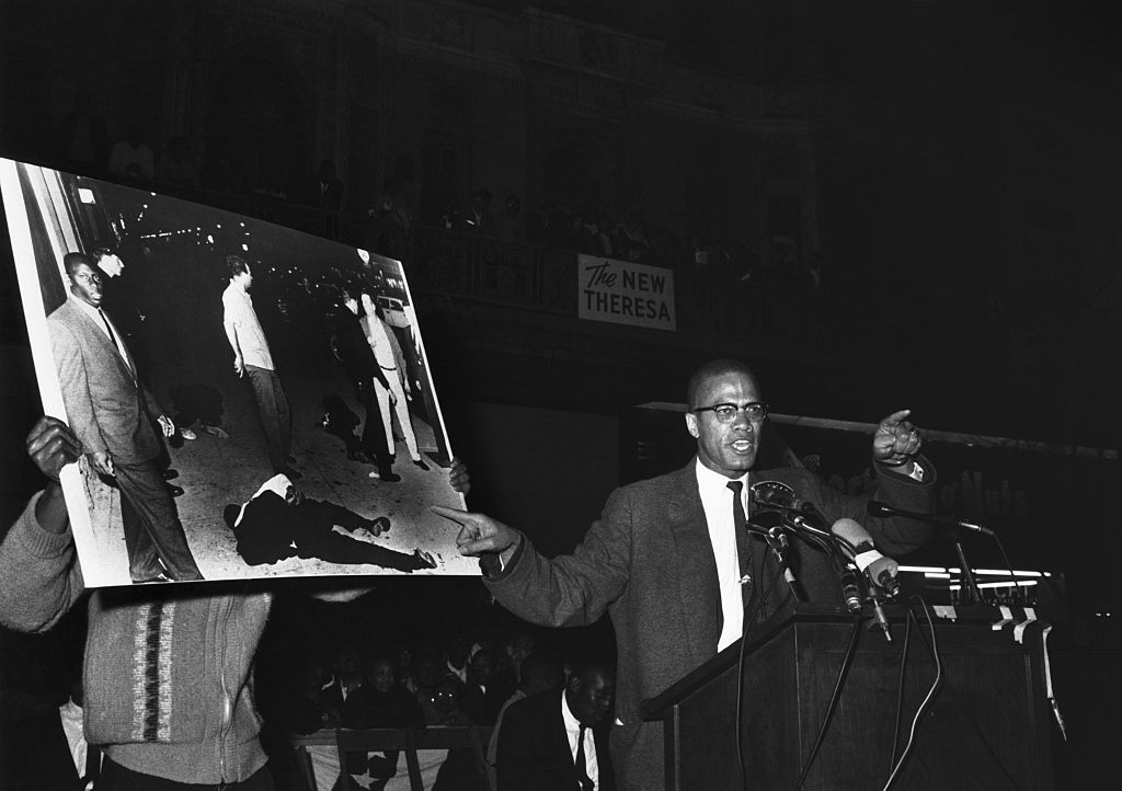 Malcolm X Talking at a Rally