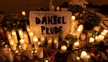 ROCHESTER, NY - SEPTEMBER 3: Candles and flowers are laid out a