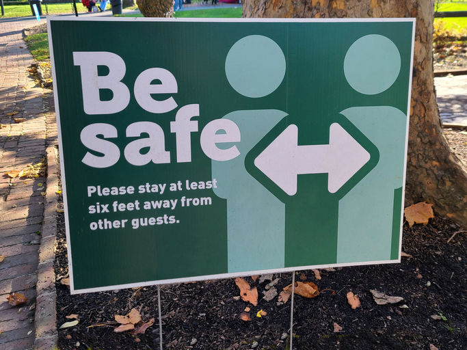 Covid-19 Be Safe and Social Distance sign