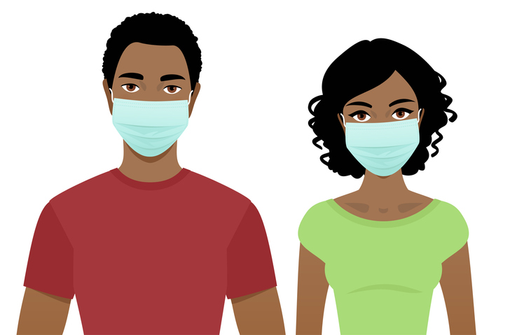 Young man and woman in surgical masks