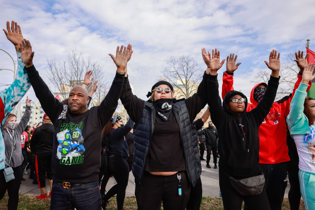 (EDITORS NOTE: Image contains profanity) Protesters chant "...
