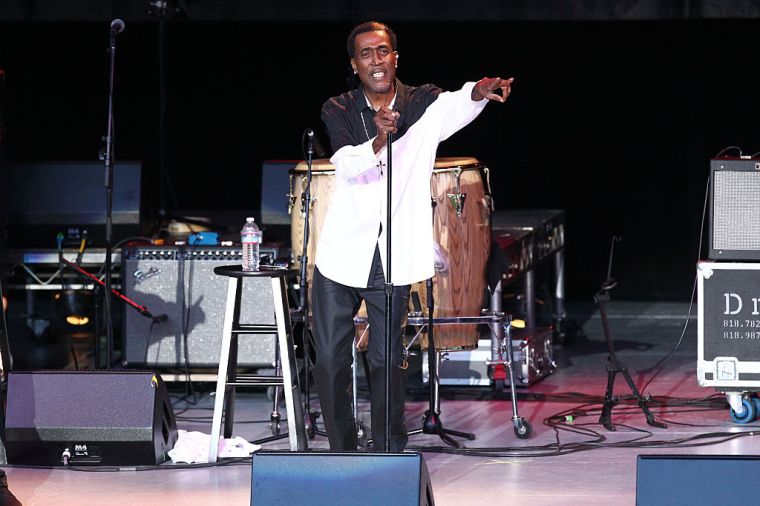 Reggie Warren, singer, 52
