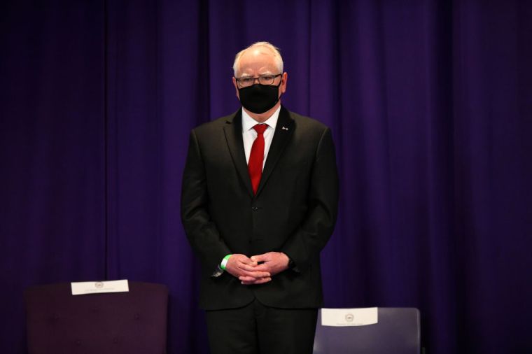 Minnesota Gov. Tim Walz attends funeral