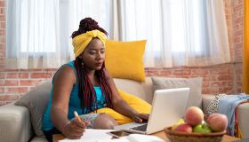 Afro woman working from home
