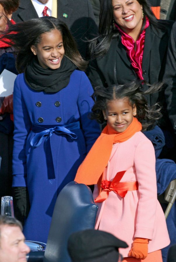 (012009 Washington, DC) Malia, 10, and Sasha Obama, 7, wait for their dad to enter for his inauguration, Tuesday, January 20, 2009. Photo by Angela Rowlings.