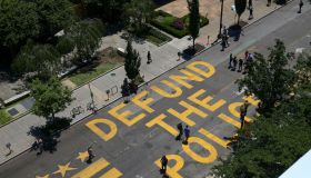 Protestors Add "Defund The Police" Messaging To Washington DC Street
