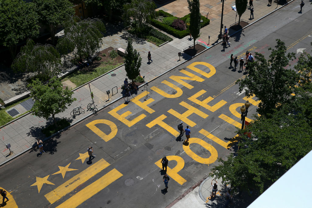 Protestors Add "Defund The Police" Messaging To Washington DC Street