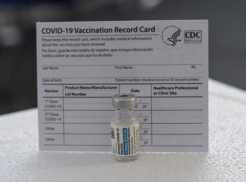 In this photo illustration a vial of Janssen COVID-19...