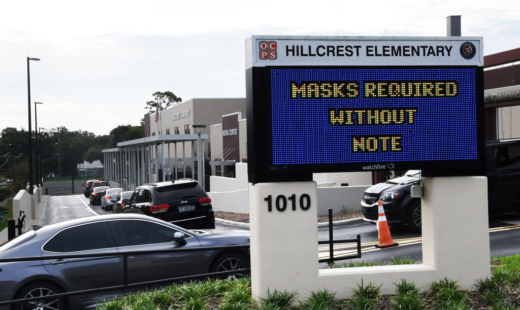 Parents drop their kids off at Hillcrest Elementary school...