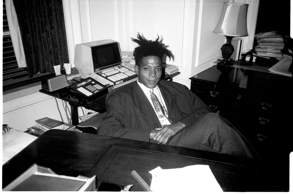 Jean - Michel Basquiat at the surprise birthday party for Susanne Bartsch at the Rainbow Roof, at Steven Greenberg's office, 30 Rockefeller Plaza