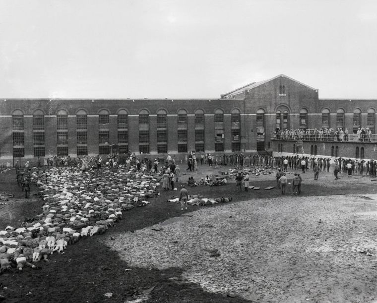 Inmates Lie on Line and Stand in Prison Yard