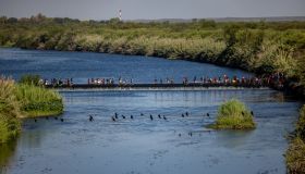 Large Migration Surge Crosses Rio Grande Into Del Rio, Texas