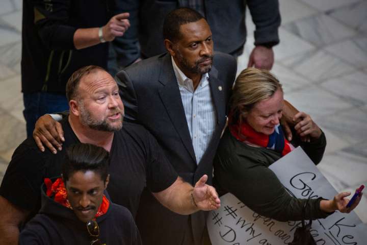 Ali Alexander along with Vernon Jones and Alex Jones lead the Sotp the Steal rally at the Georgia Capitol Building